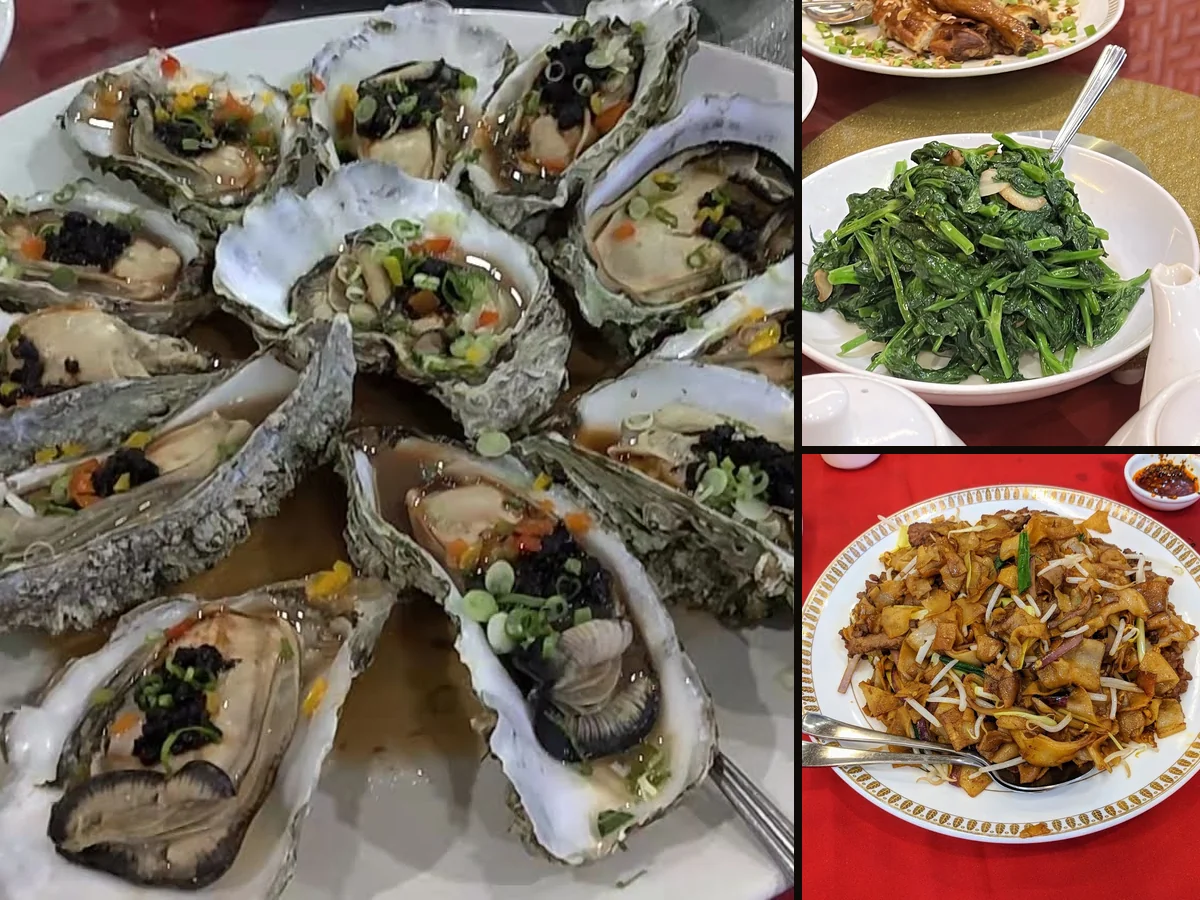 Steaming Cantonese dishes on a busy table.