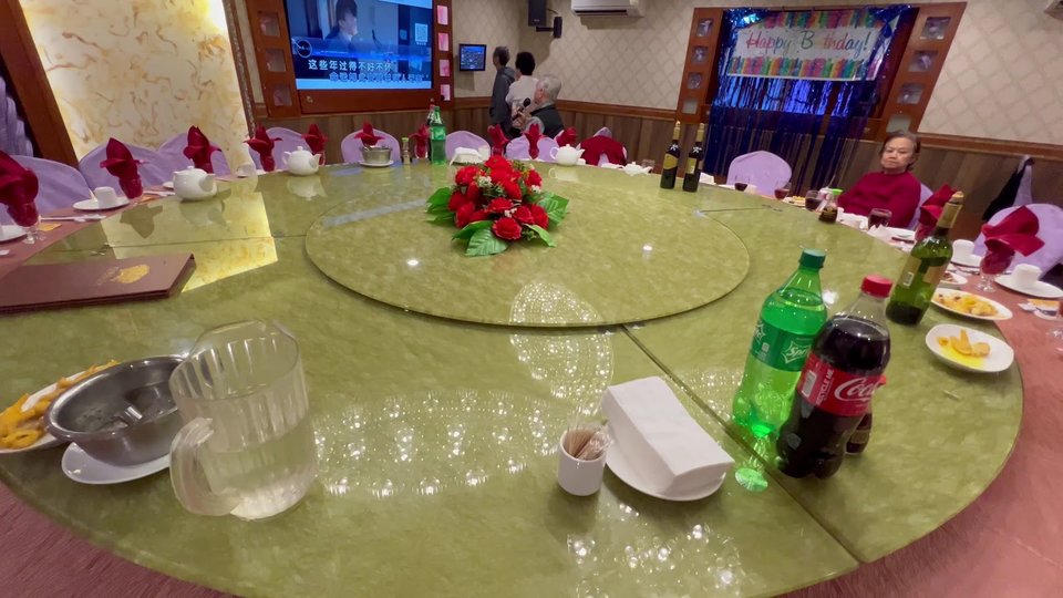 Plates of seafood and rice dishes spread out.